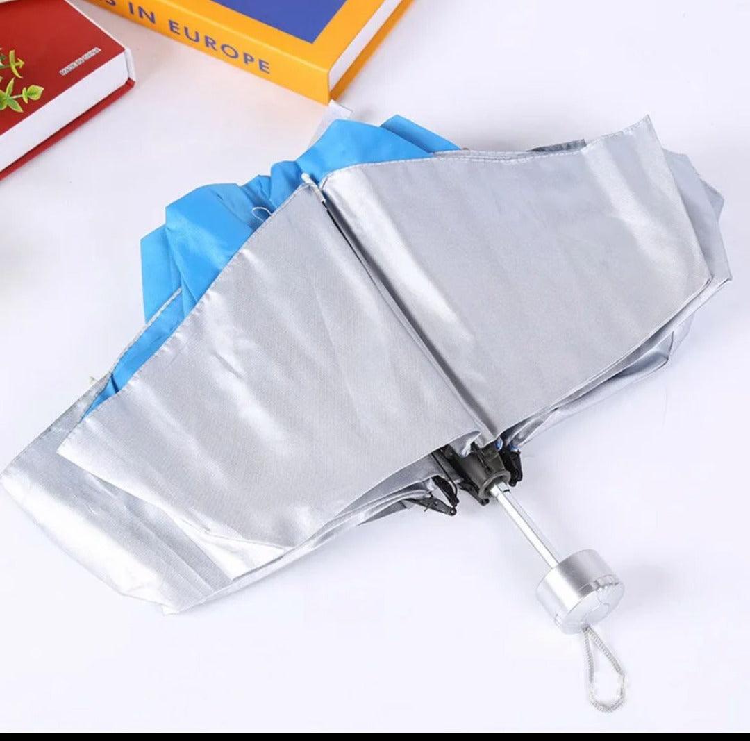 Sombrilla plegable de cartera - Proteccion UV - El Baúl de Mamá